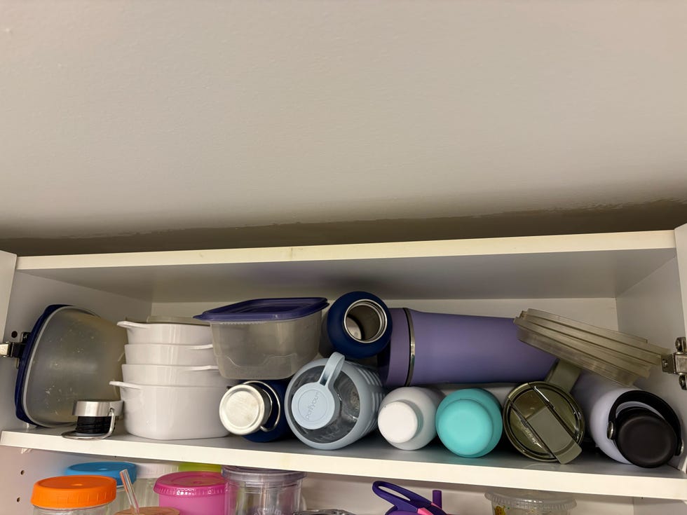 container storage in a kitchen cabinet