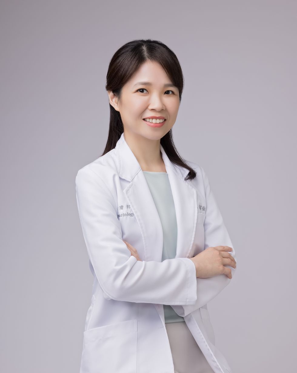 a person in a white coat