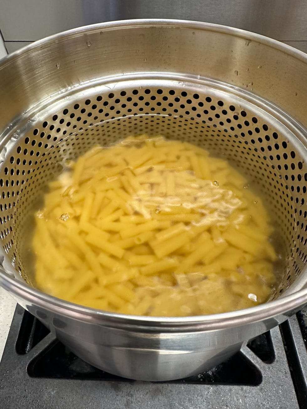 pasta cooking in a pasta pot