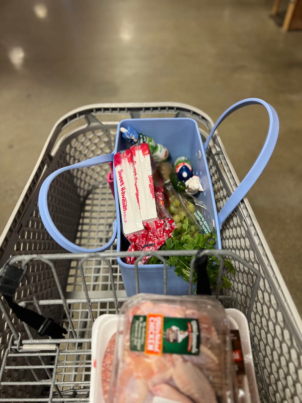 bogg bag original in a shopping cart filled with groceries