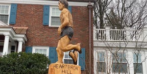 tree sculpture of a runner on the boston marathon course