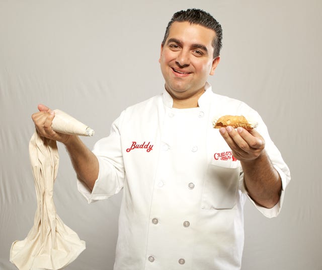Chef's uniform, Cook, Chef, Chief cook, Gesture, Food, Pastry chef, Cooking show, Smile, Cuisine, 