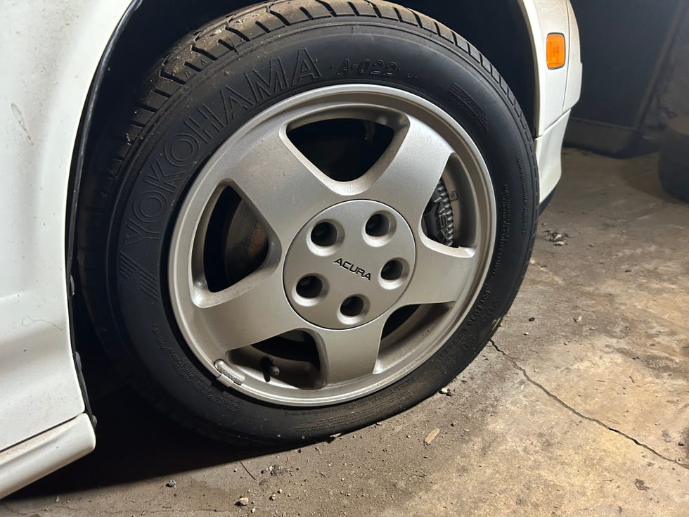 next to a car tire