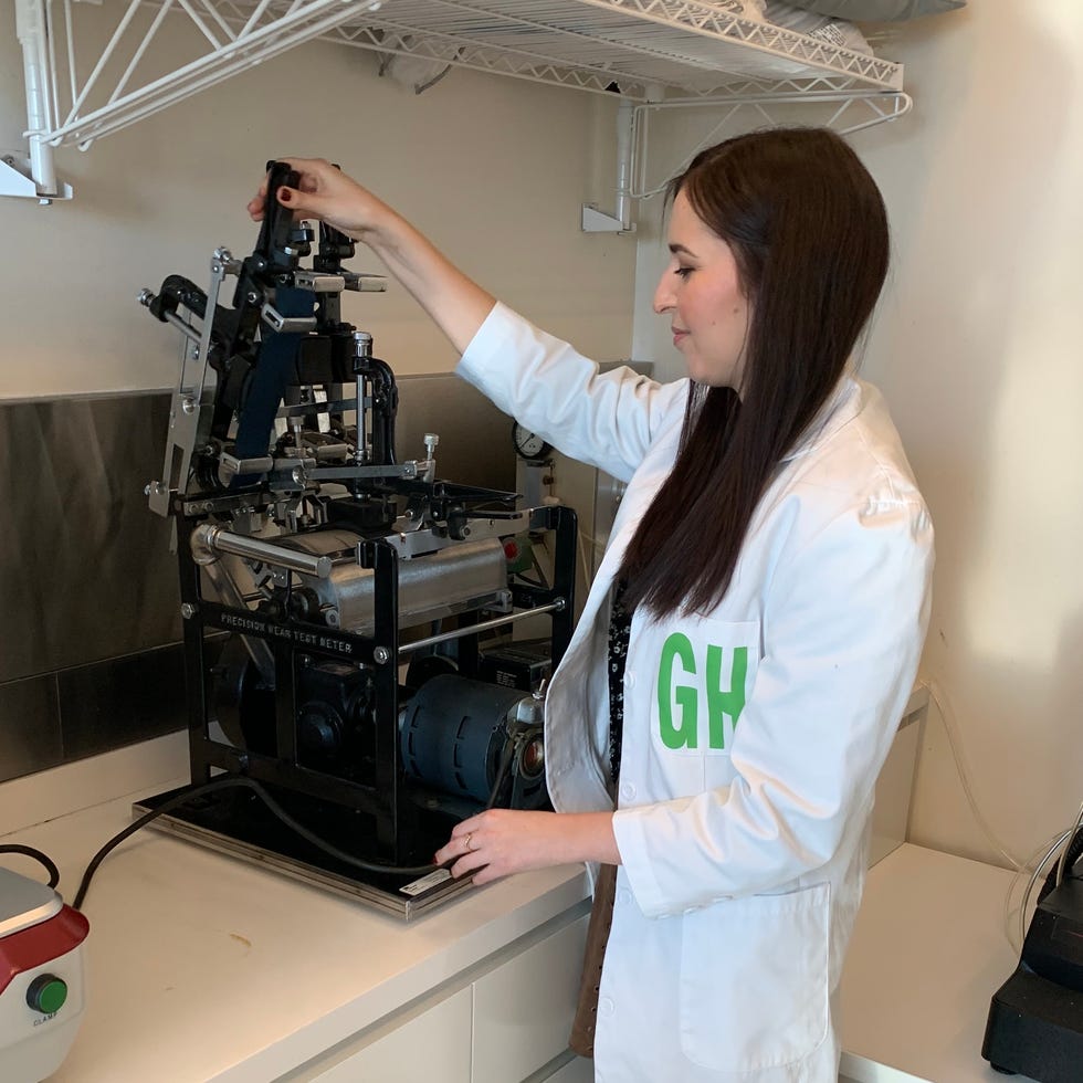 how good housekeeping tests luggage good housekeeping institute senior textile analyst, emma seymour, loading fabric luggage swatches through an abrasion tester machine