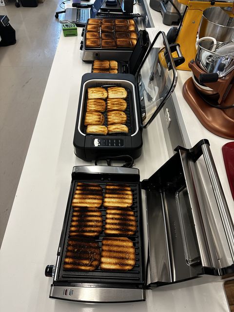 four indoor grills testing heat distribution on bread