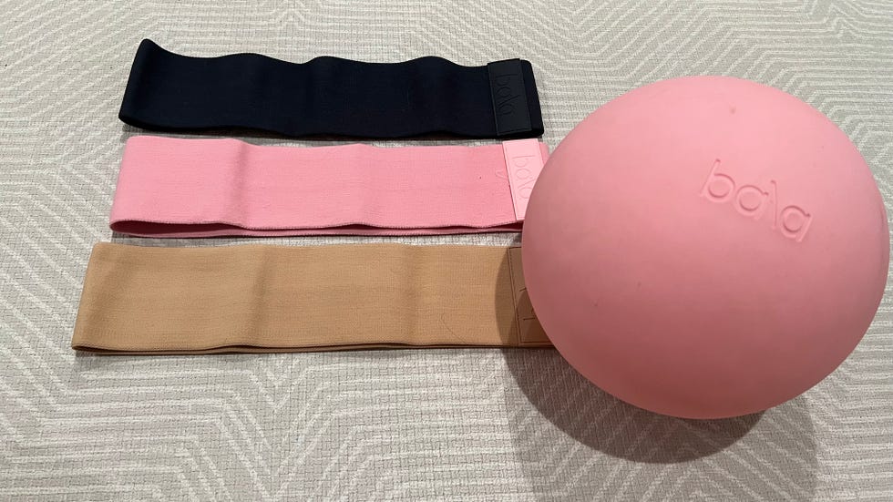 assortment of products including resistance bands and pilates ball from bala