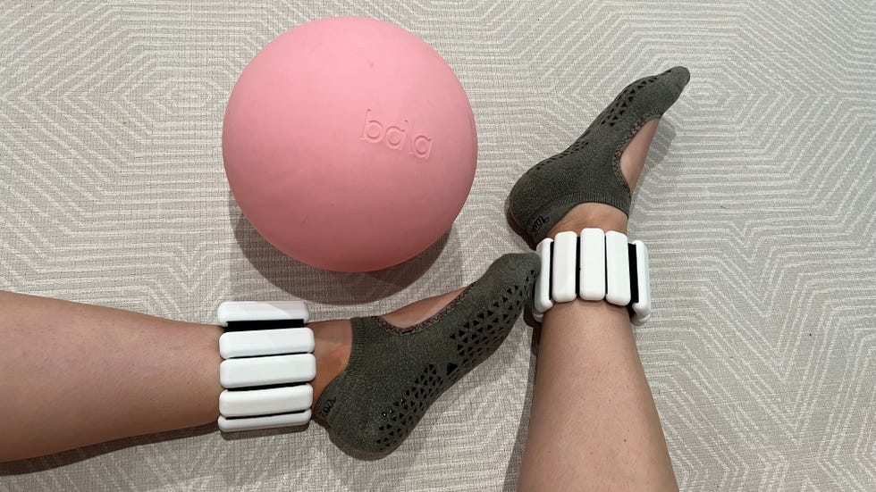 fitness accessories including bala weighted ankle bands and a pink workout ball
