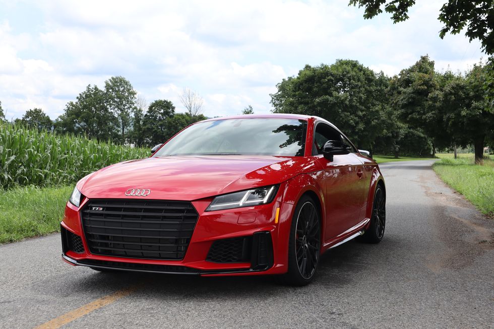 2023 audi tts in red parked on new jersey farmland