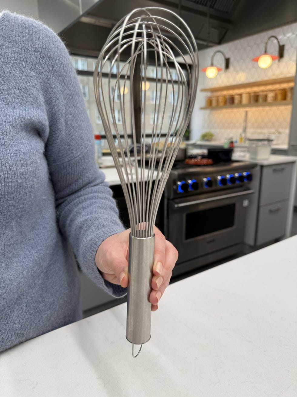 a variety of different sizes and shapes of whisks