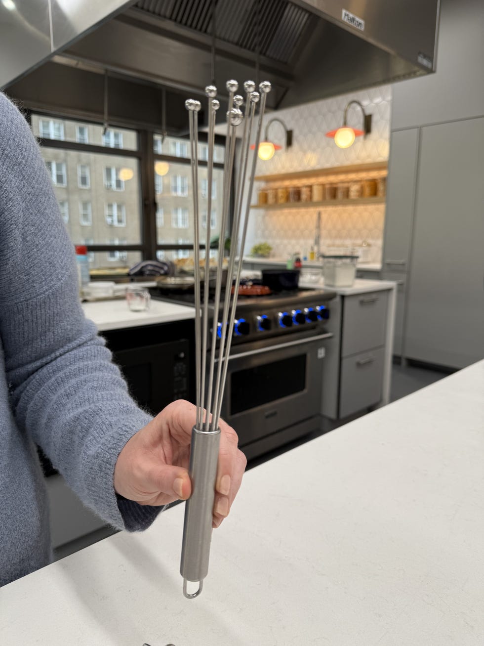 a variety of different sizes and shapes of whisks