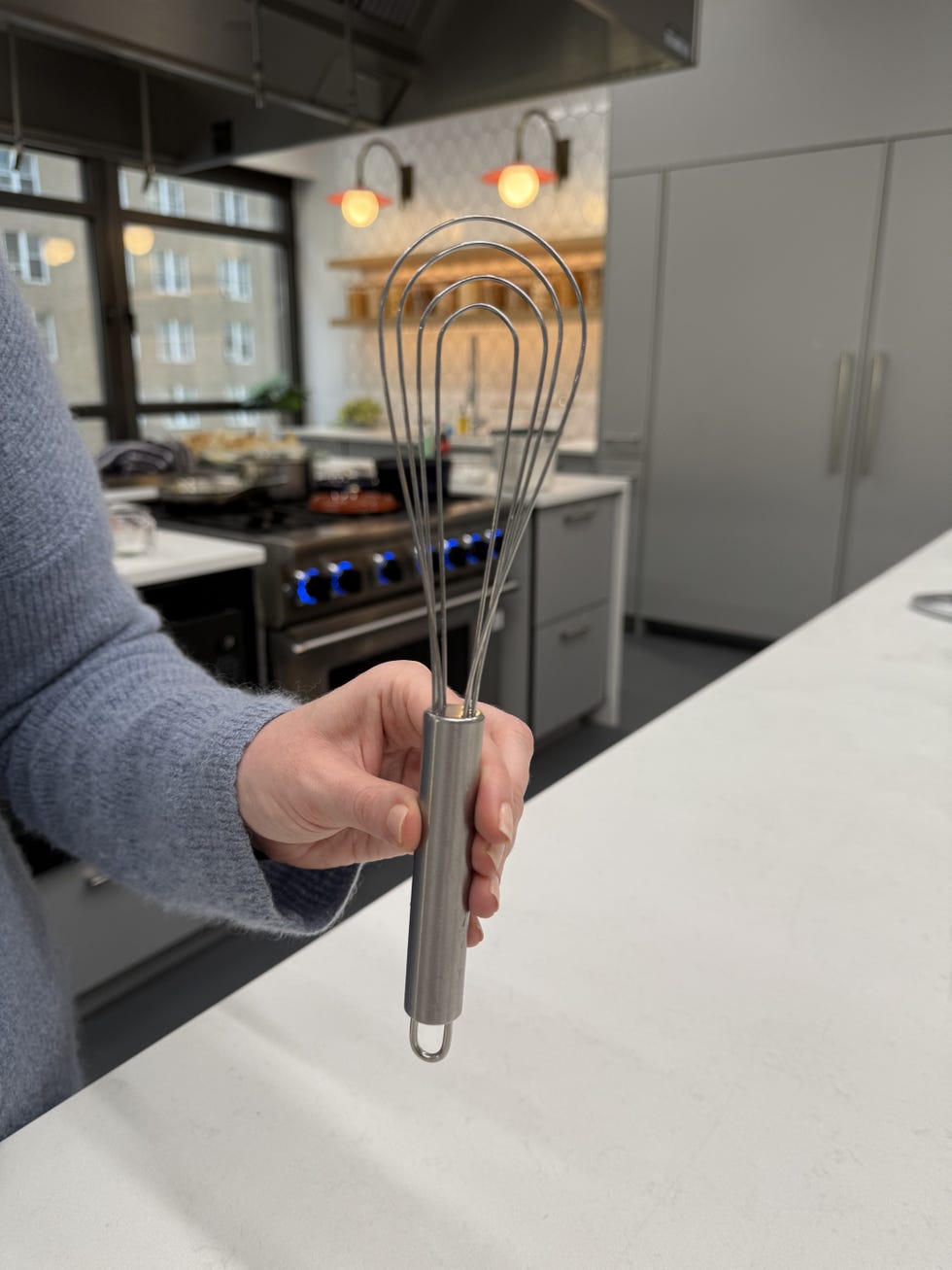 a variety of different sizes and shapes of whisks