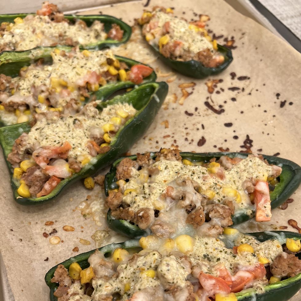 sassos preparing stuffed peppers from home chef in her home