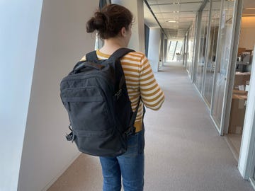 testing the black bagsmart backpack at the good housekeeping institute