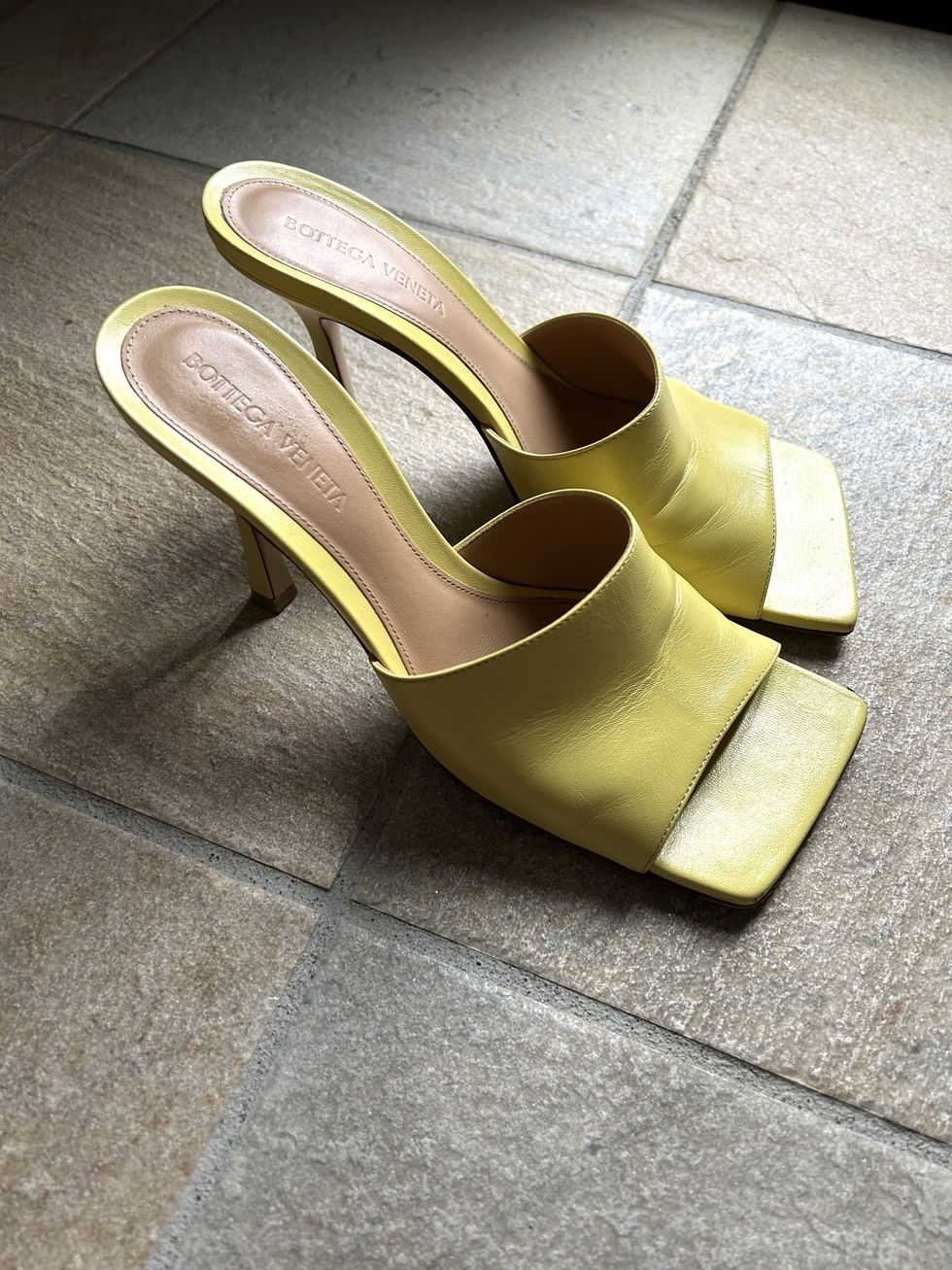 a pair of yellow sandals