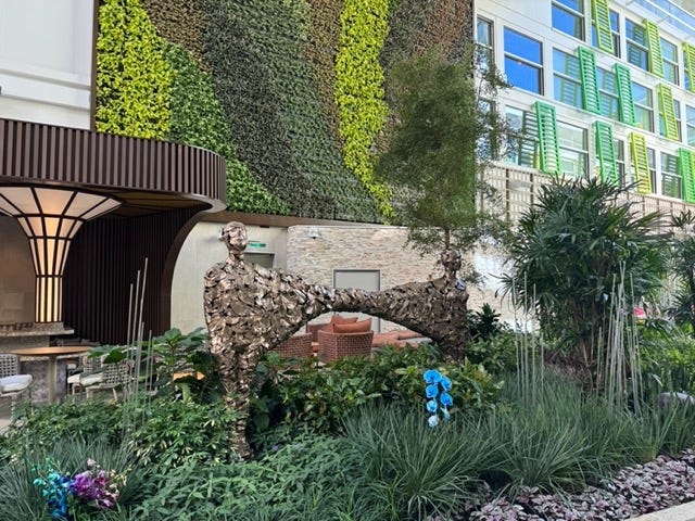 a garden with a stone structure