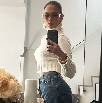 jlo elevates a knit sweater with lots of bling