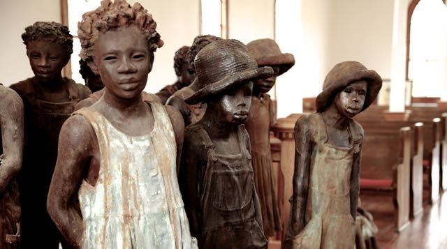 whitney plantation museum, salve statues within church, slave children