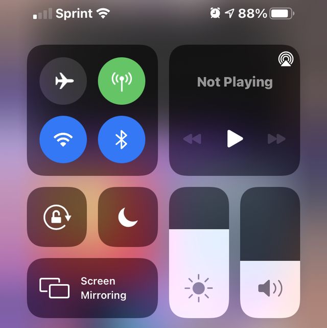 iphone settings with brightness slider in the bottom right corner