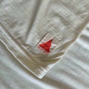 a red heart on a white sheet