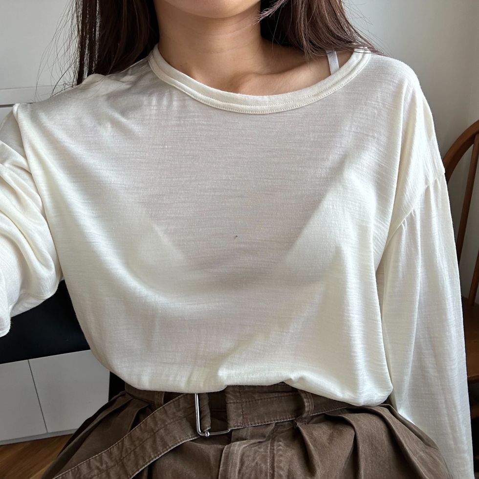 a woman wearing a white shirt
