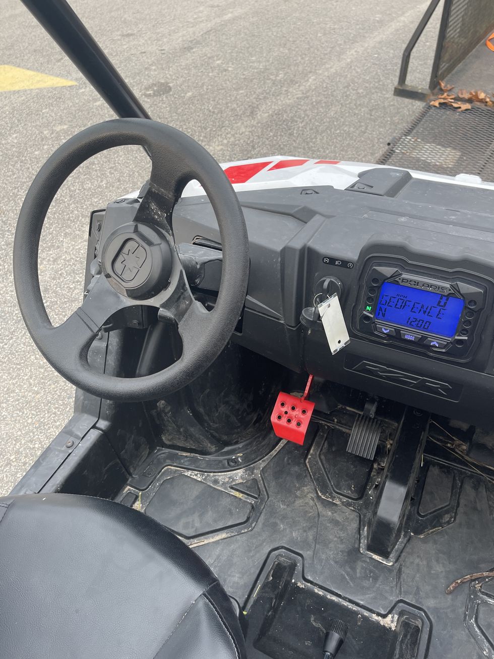 polaris rzr interior view with steering wheel and pedals