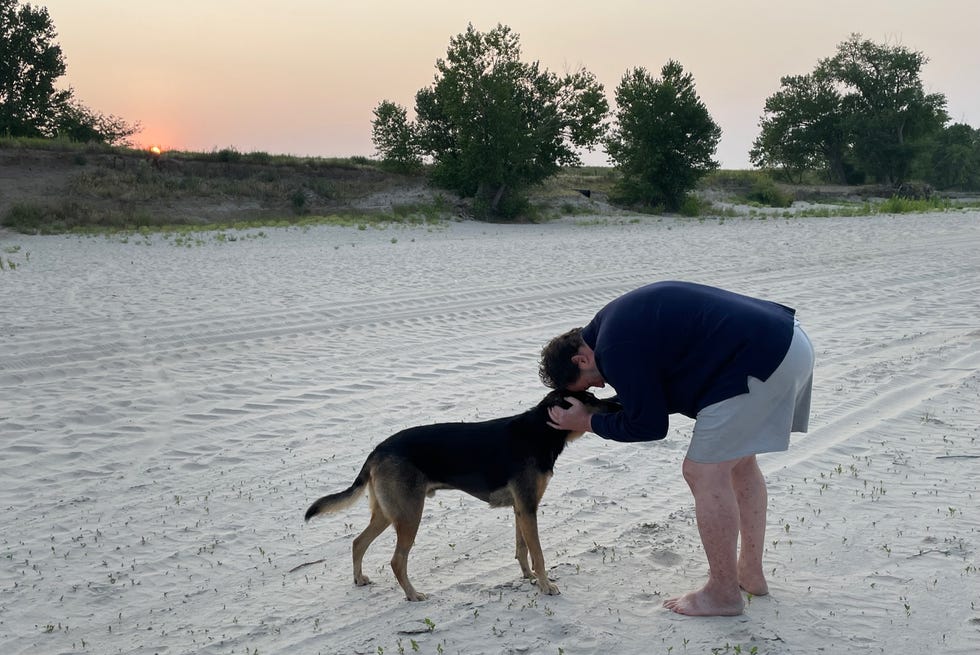 chris and lucky on the beach