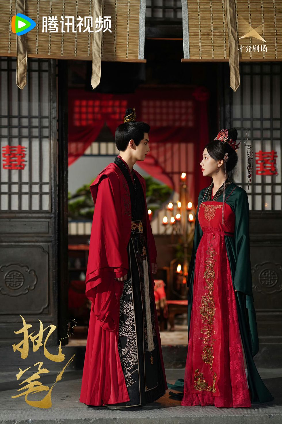 a man and woman in red robes