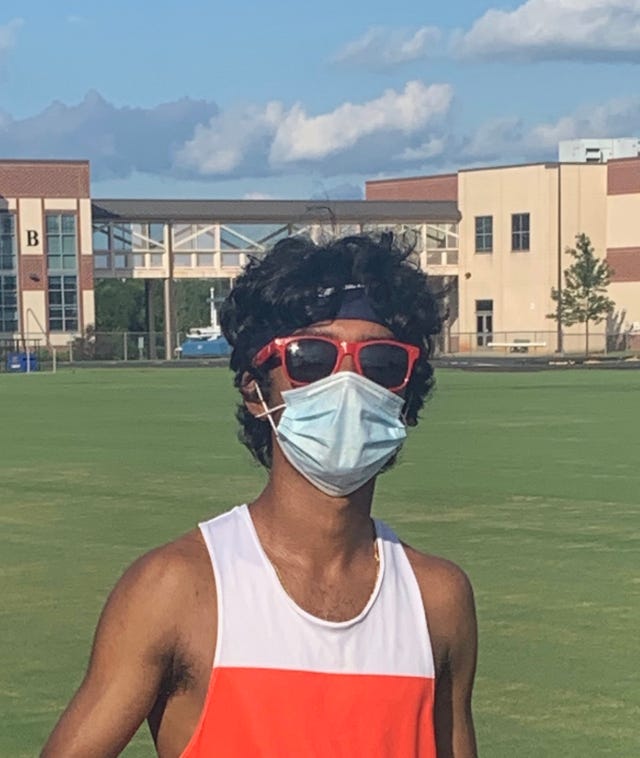 madhav bhat wearing a mask for his maskedmile social media challenge