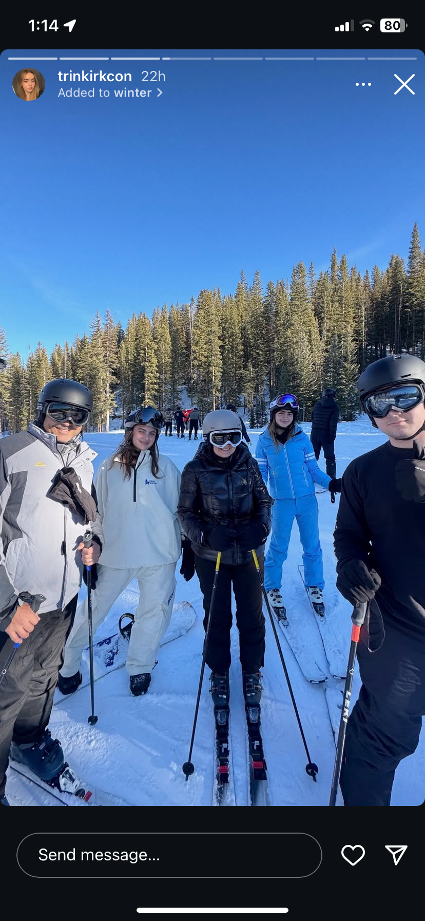 group of ski enthusiasts in a winter setting