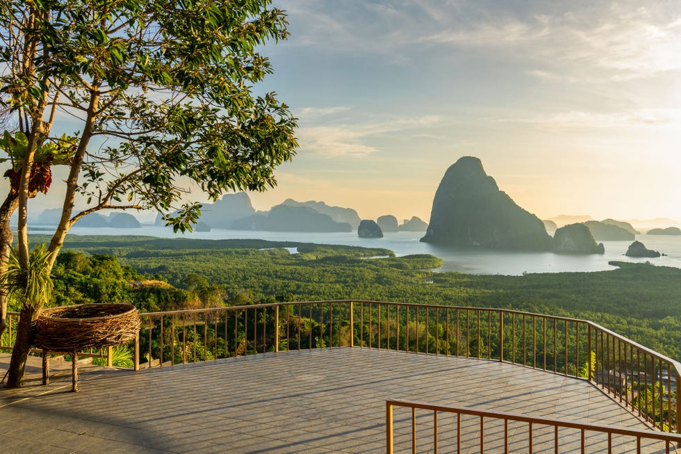 scenic viewpoint overlooking a river and rock formations surrounded by greenery scenic viewpoint overlooking a river and rock formations surrounded by greenery