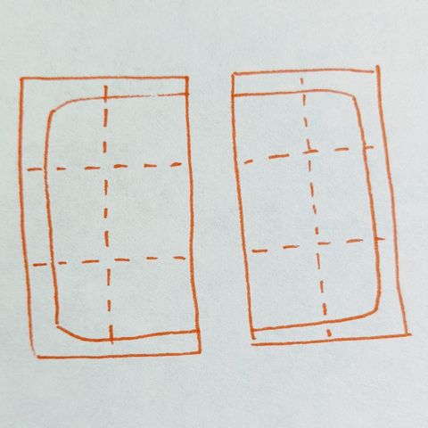 an orange line drawing of a square cut in half down the middle, with each half divided into six square "bites" with dotted lines