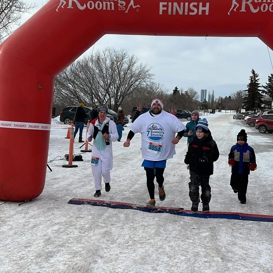 preview for Man Breaks Guinness World Record for Most T-Shirts Worn in a Half Marathon