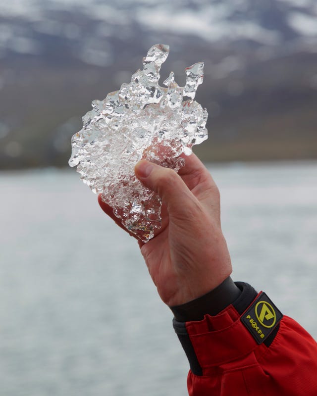 iceberg fragment in greenland ancient air in bubbles