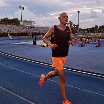 a person running on a track cristobal nogues