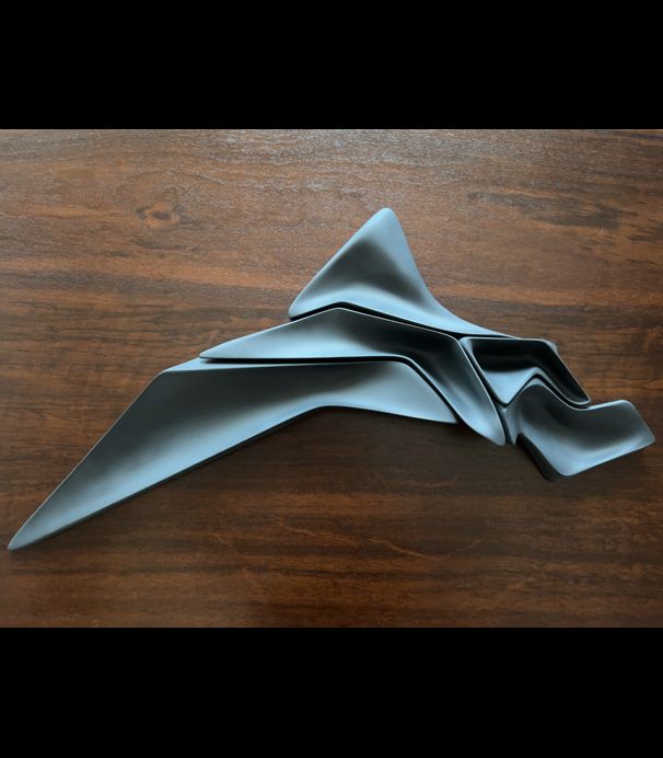 a black and white paper airplane
