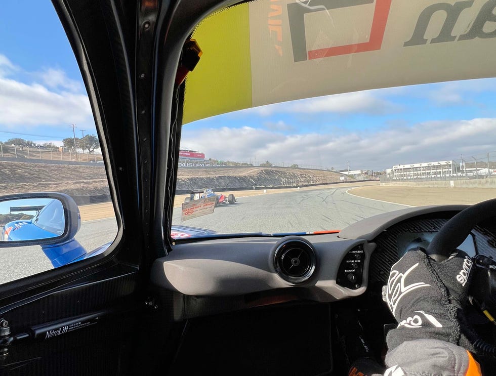 a view of a road from inside a car