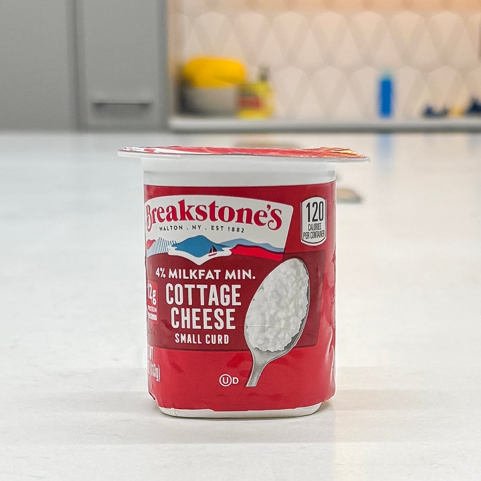 container of cottage cheese on a kitchen counter