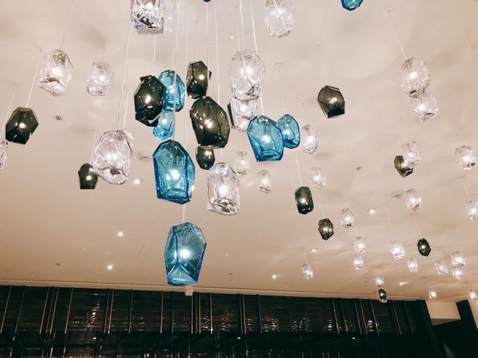 Lighting, Light fixture, Chandelier, Ceiling, Turquoise, Wall, Ceiling fixture, Lighting accessory, Crystal, Interior design, 