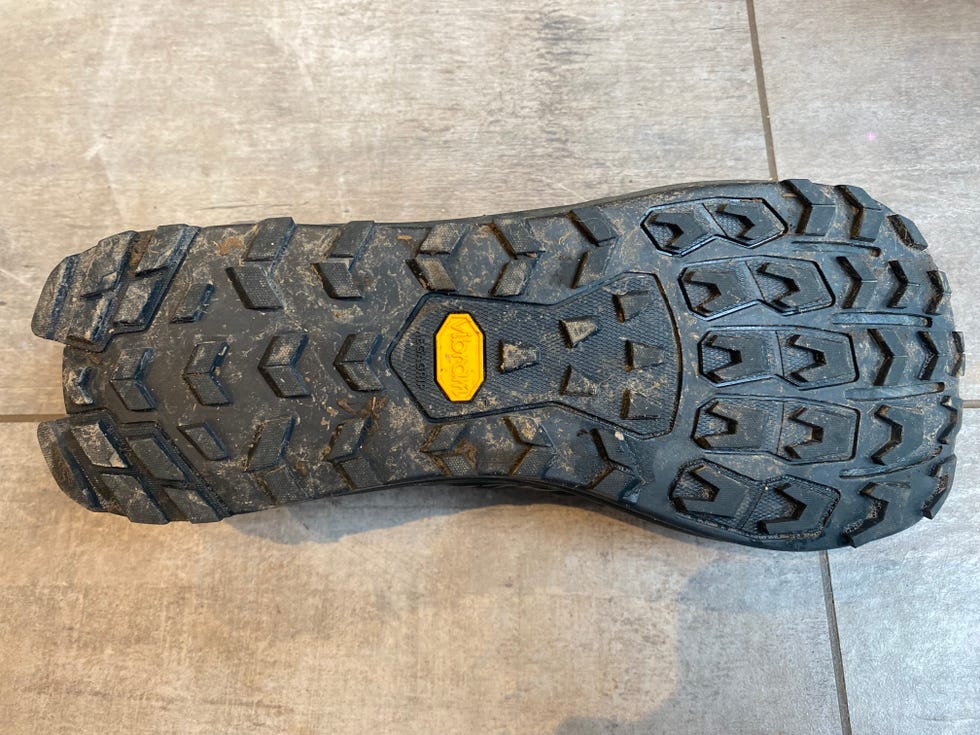 rubber shoe sole with a rugged tread pattern