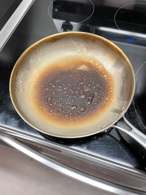 testing an electric stovetop with a stainless steel pan on top of a burner, showing a heat distribution