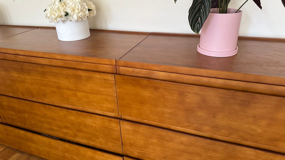 a close up of the thuma dresser wood