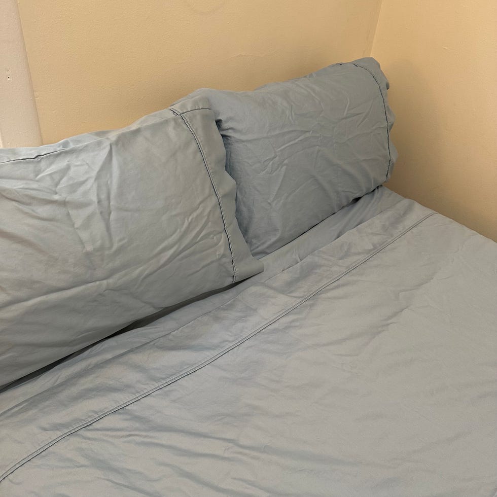 blue california design den sheets made on a bed