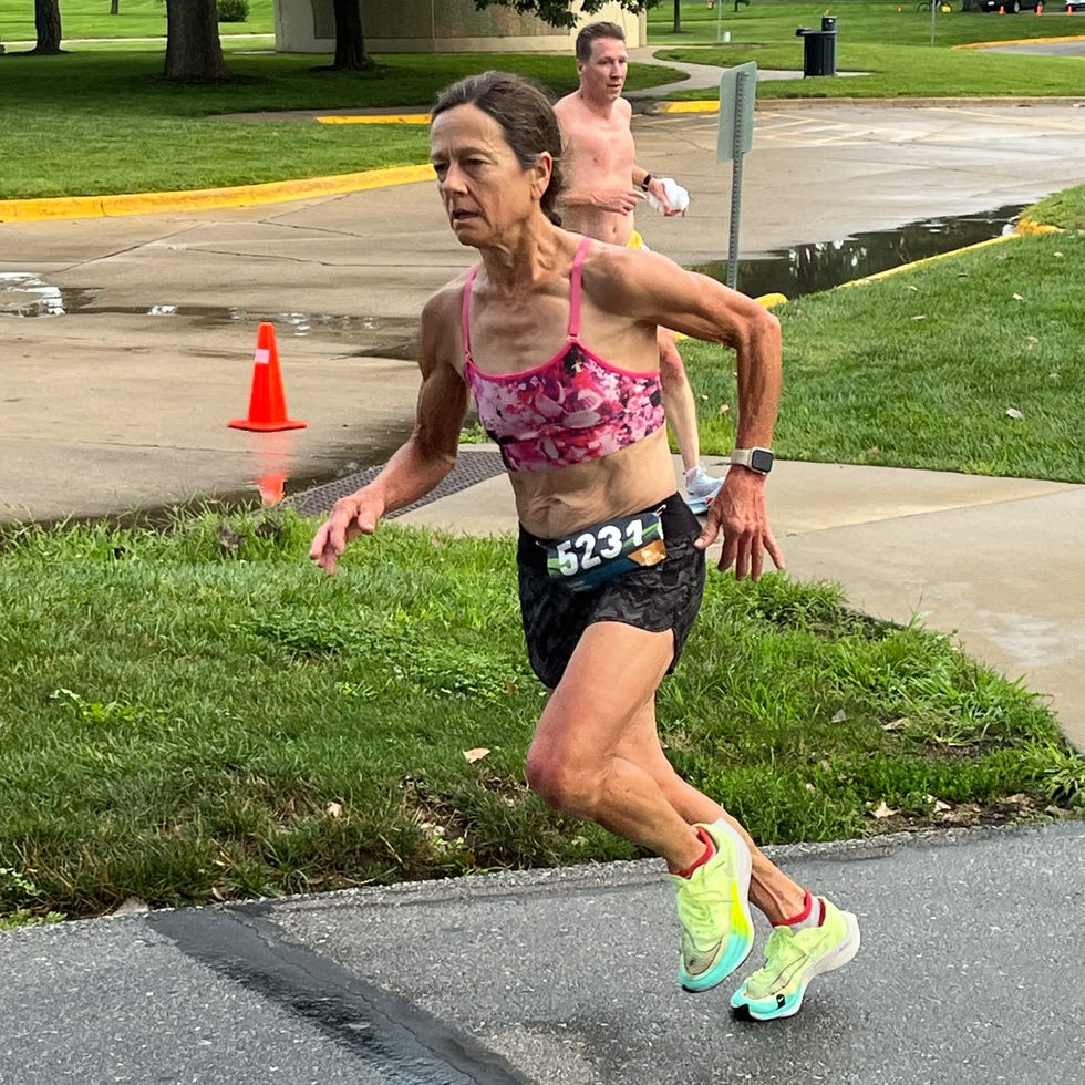a runner in a race rounding a corner