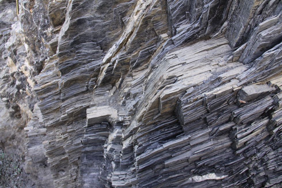 a close up of a rock wall