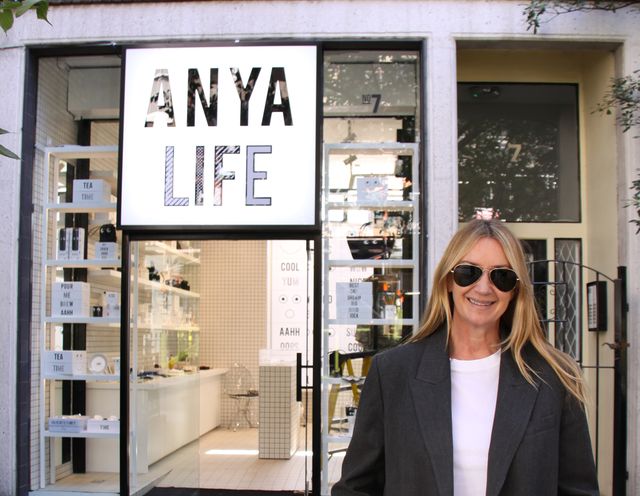 british designer anya haindmarch standing in front of her new store front