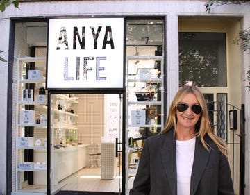 british designer anya haindmarch standing in front of her new store front