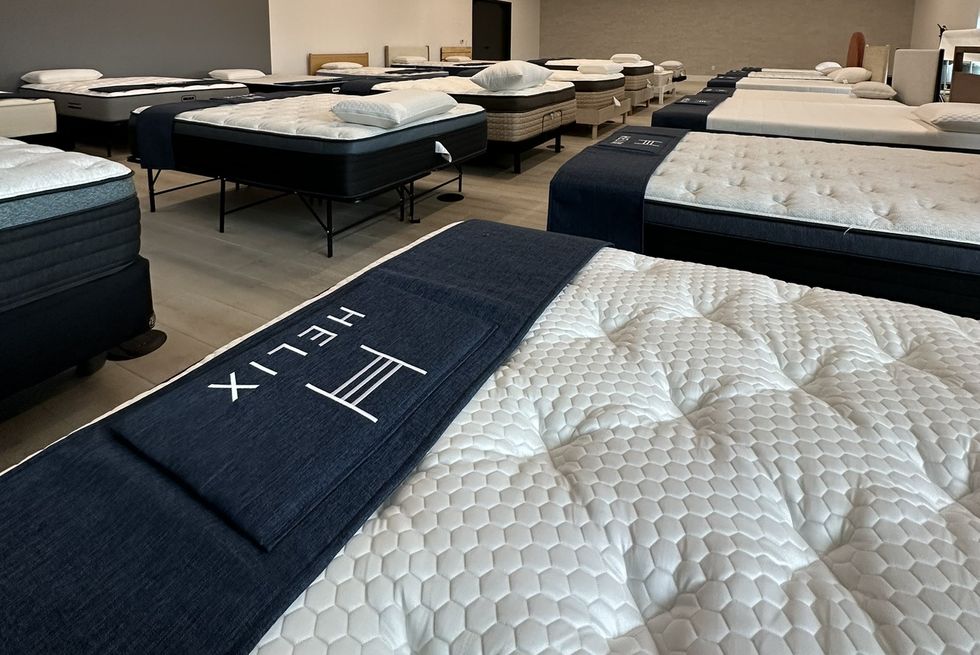 a room with helix mattresses