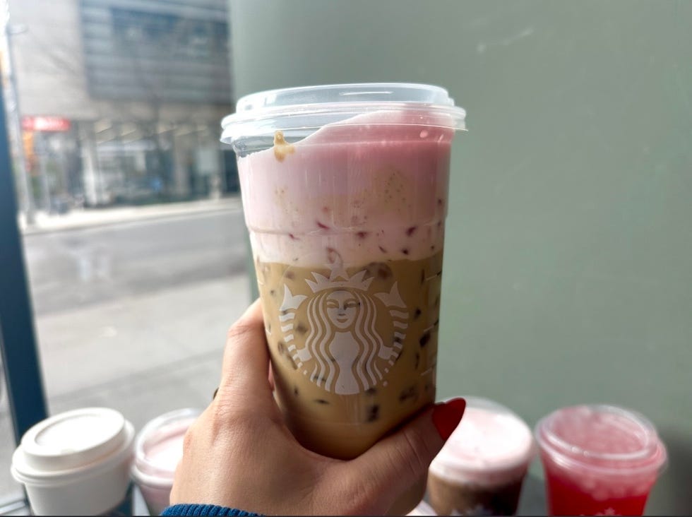 iced beverage with layered colors served in a clear cup
