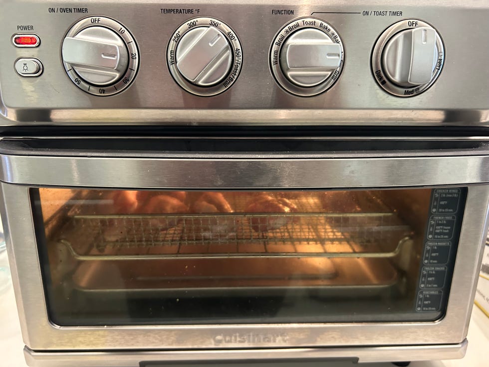 a stainless steel oven with a clear glass door