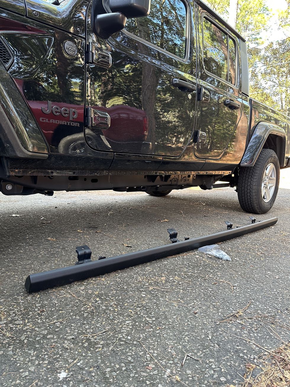 jeep gladiator with rock rails on the ground